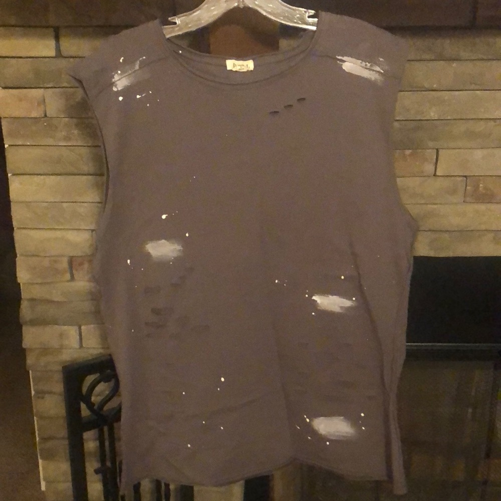 Distressed sleeveless shirt